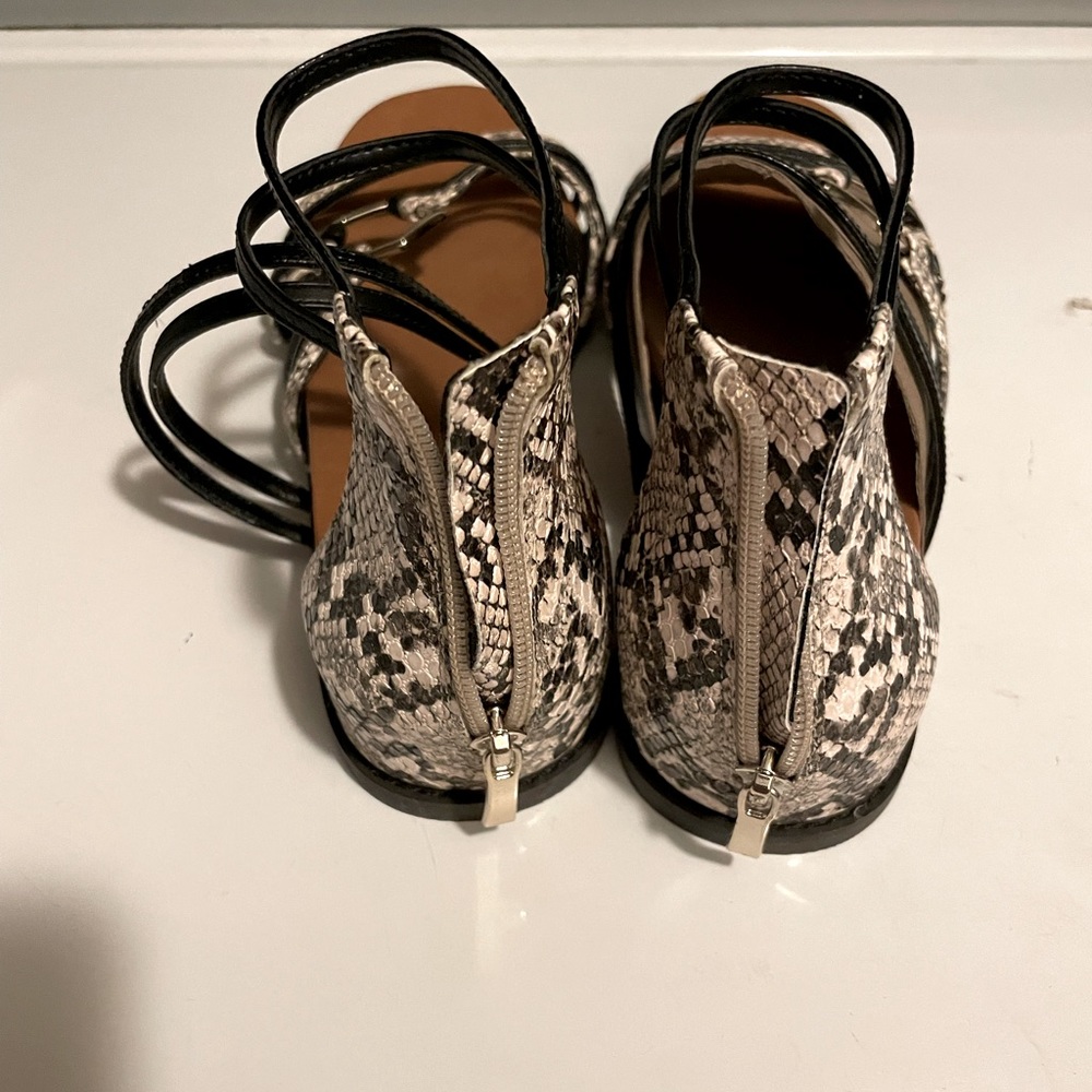Size 9 brand new sandals. Never worn.